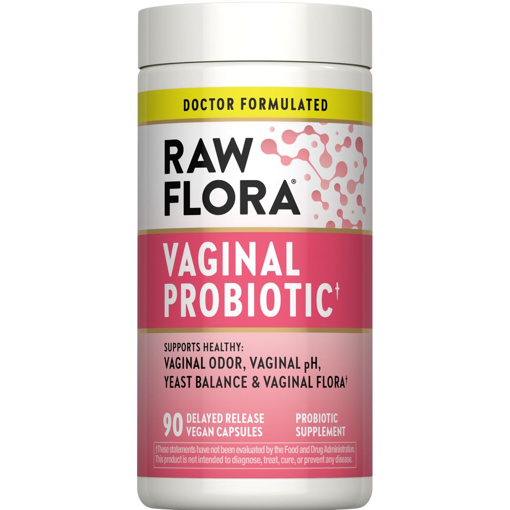 A hand holds a bottle of Vegan Vaginal Probiotic Capsules, featuring 90 delayed-release capsules for gut health and wellness.