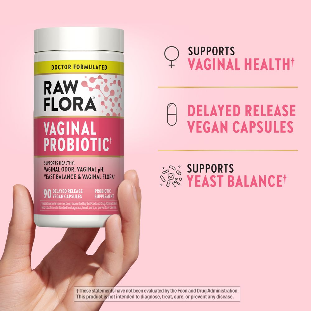 Hand holding a bottle of RF Vaginal Probiotic, featuring 90 delayed release vegan capsules for women's health.
