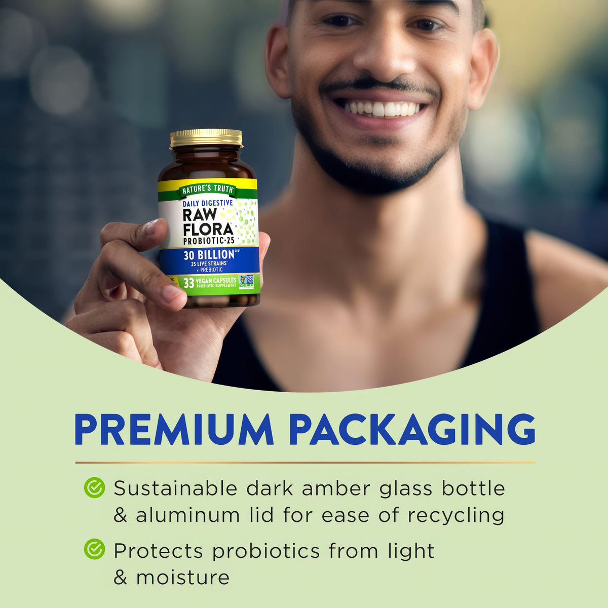 A young adult male is smiling and holding a bottle of Raw Flora 30 Billion.