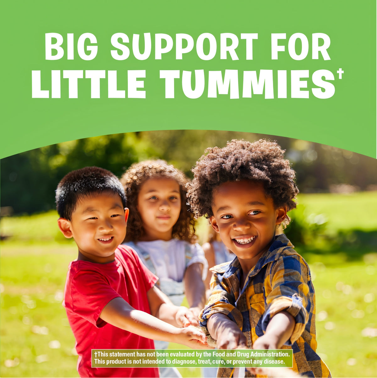 Three diverse children smiling and holding hands in a sunny park. Text: 'BIG SUPPORT FOR LITTLE TUMMIES'.